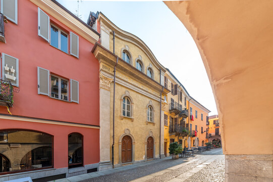 Historic Synagogue building in Cuneo, Piedmont, Italy in ancient Jewish ghetto of Contrada Mondovi,  yellow facade features Hebrew inscriptions and neoclassical architecture 