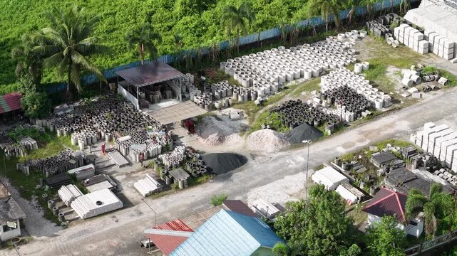 Activities of workers making culverts and bridge blocks