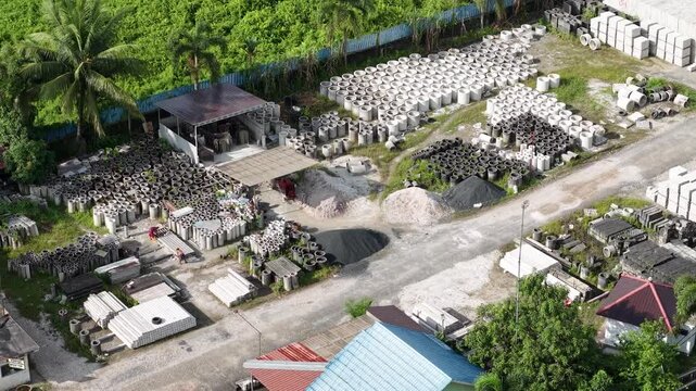 Activities of workers making culverts and bridge blocks