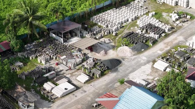 Activities of workers making culverts and bridge blocks
