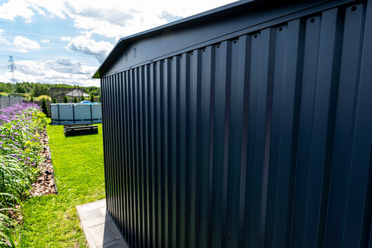 Modern anthracite garden shed showcasing sheet metal siding