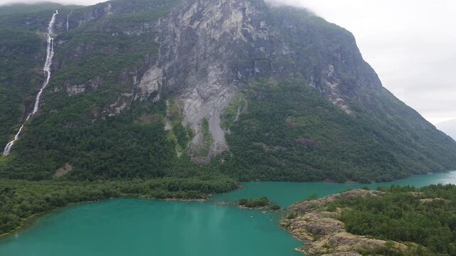 Wide Aerial Panorama of Ramnefjellet and Lovatnet in Loen, Norway