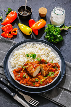 German Frikadelle in Sweet Pepper Lecho With Rice