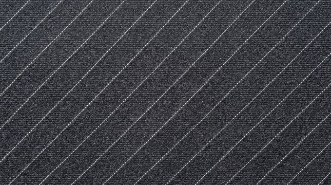 Close up of dark gray fabric with white pinstripes