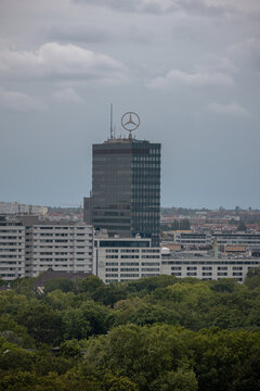 Berlin, Germany - JUly 4, 2026: Mercedes-Benz logo atop an office tower in Berlin, Germany.
