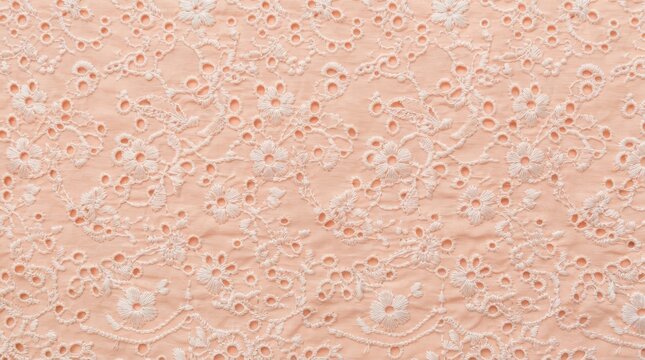Peach fabric with white floral embroidery pattern