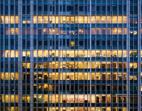 seamless texture highrise building facade at night illuminated window pattern regular structure architecture tile