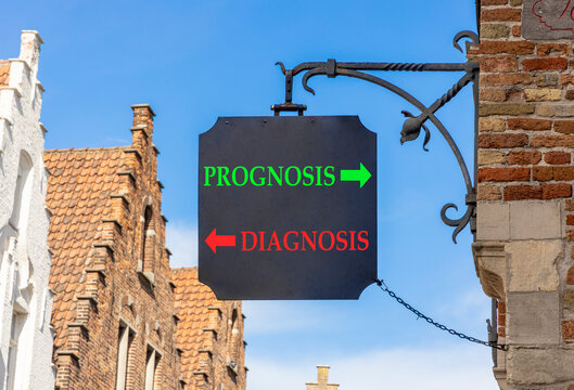 Prognosis vs diagnosis words symbol. Concept words Prognosis Diagnosis on beautiful black road sign. Beautiful blue sky background. Business medical prognosis vs diagnosis concept. Copy space.