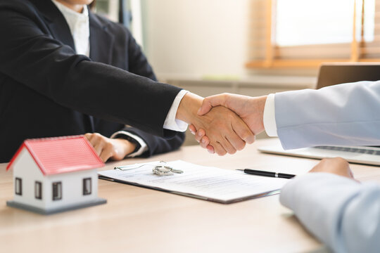 Real estate, success deal asian young woman handshake or shaking hand with landlord realtor, client male after buyer man signed rental, lease contract. Banker agreement mortgage loan, property lease.