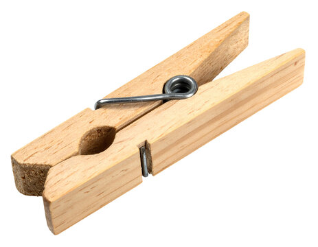 Isolated wooden clothes peg on a black background for laundry and DIY projects