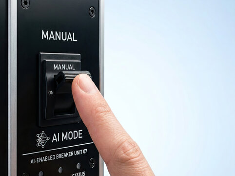 Manual switch breaker lever finger ai mode control panel automation, human finger pressing black manual breaker lever toward ai mode on control panel, technology transition concept
