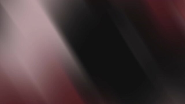 Abstract background displays dark crimson waves in a smooth motion gradient composition.