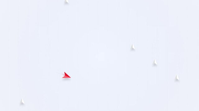 Red paper airplane flying through white sky with other paper planes.