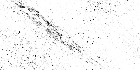 Obraz premium Grungy distressed overlay vintage rough scratched black particles are surrounding on the white background as black and white grunge texture
