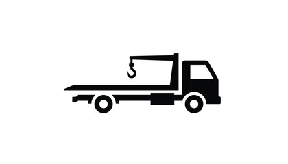 Fototapeta premium Silhouette of a commercial tow truck flatbed tow vehicle with hoist crane hook isolated on white background.