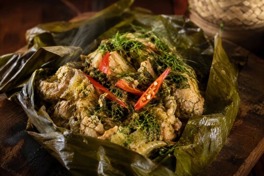 Traditional Lao steamed chicken in banana leaf Mok Kai with aromatic local herbs and spices, authentic Asian food illustration, generative AI