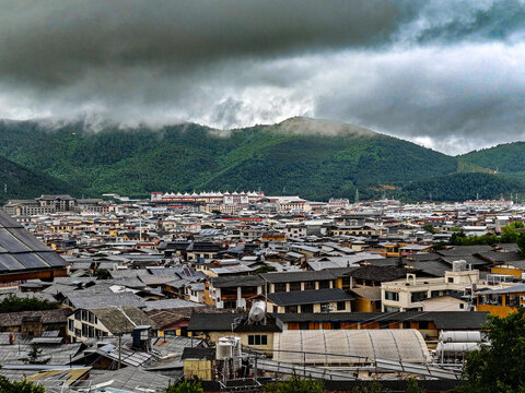 Traditional Tibetan Plateau Town with Mountain Landscape