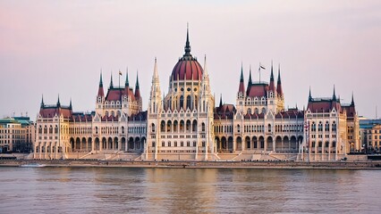 Fototapeta premium Budapest Parliament Building Majestic Exterior View on Danube River at Sunset - Hungary European Architecture Travel Photography