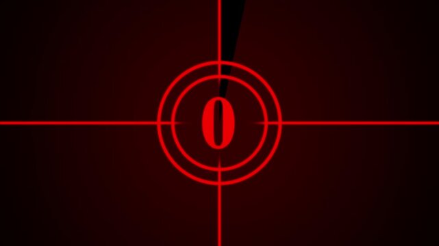 Red countdown leader featuring the number three centered within concentric circles and intersecting crosshair lines on a dark background
