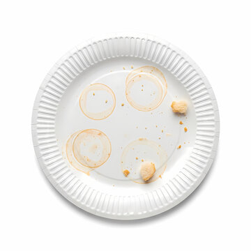 Used disposable paper plate showing round beverage rings and leftover crumbs after a casual snack break at an office gathering or event where refreshments were served to many guests during lunch