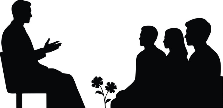 Silhouette of a speaker addressing an audience with flowers in the foreground talking