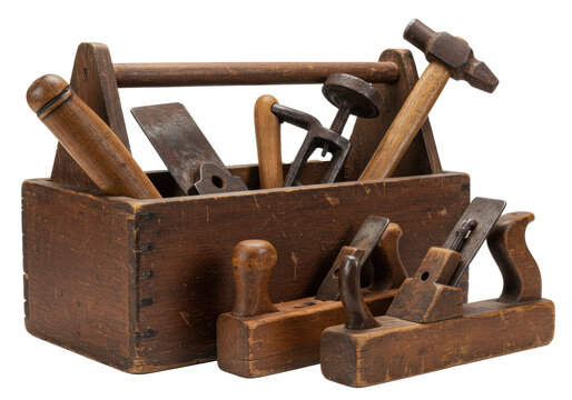A vintage mahogany toolbox with antique woodworking tools like a handsaw and hand planes on a white background. Concept of traditional enduring craftsmanship