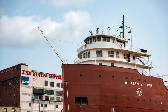 Duluth, MN, USA - July 25, 2026: The William A. Irvin museum ship docked next to The Suites Hotel at Canal Park.