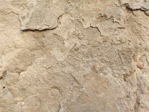 Uneven Adobe Plaster Lumpy light brown architectural coating for traditional Mediterranean concepts rustic building designs and vintage textured wallpapers