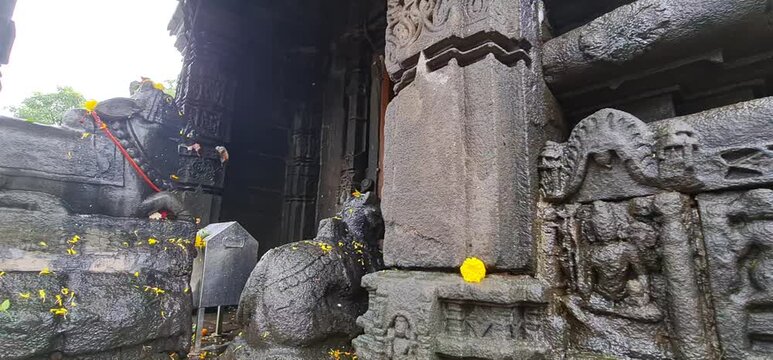 Intricate Deep Stone Carvings and Weathered Bas Relief Sculptures on Ancient Wall of Shri Ambareshwar Shiva Temple, Maharashtra