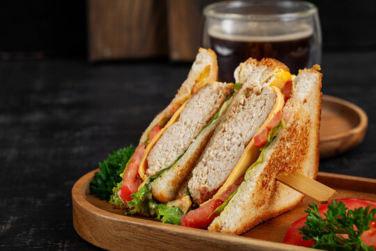 Chicken Sandwich with Cheese and Tomato Served with Coffee on Wooden Tray