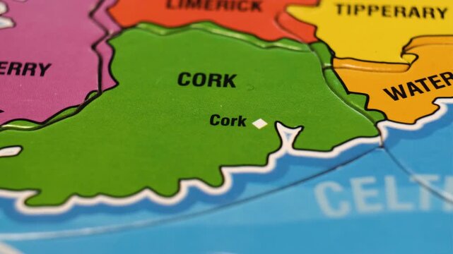 Ireland Map Puzzle Blocks with Irish Cities Cork, Kerry, Waterford. Close-Up Video Background, Dolly Footage. Camera moves from right to left.