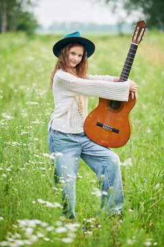 playing guitar outdoors