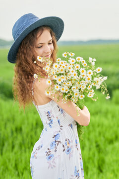 Romantic girl with daisies
