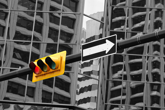 Traffic Light on Pole with City Buildings or Skyscrapers in the Background for Big City Environmentt