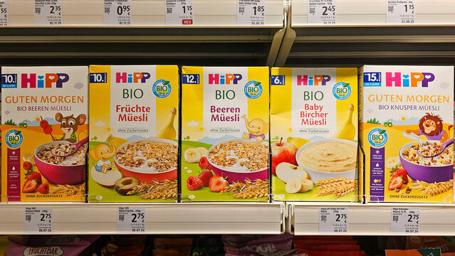Hipp organic baby food muesli cereal boxes on store shelf