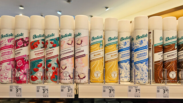 Batiste dry shampoo retail display showing various products