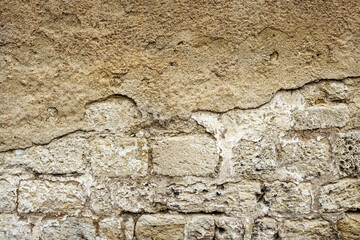 Fototapeta premium The stones of the wall will breathe if the render is removed.