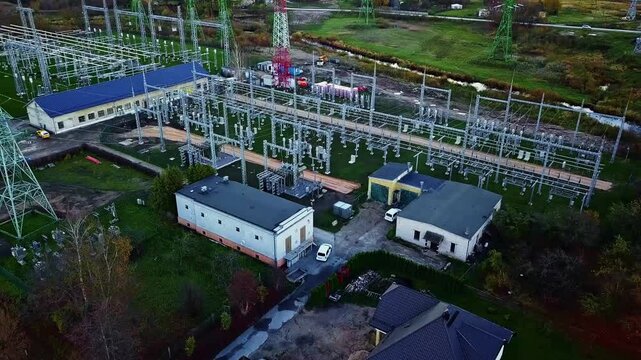 Aerial view of an electrical substation with power lines and transformers in Riga, Latvia.