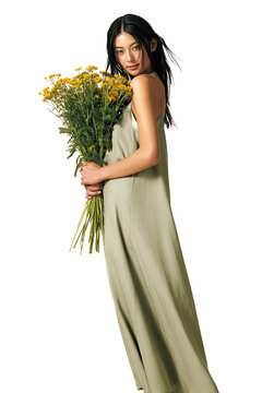 Beautiful asian woman posing with yellow yarrow flowers isolated on transparent background png element