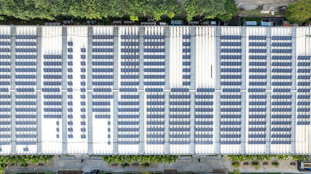 Aerial view of the solar panel array on the roof of the Mercado Livre headquarters, featuring rows of photovoltaic cells for renewable energy generation in Osasco, State of Sao Paulo, Brazil.