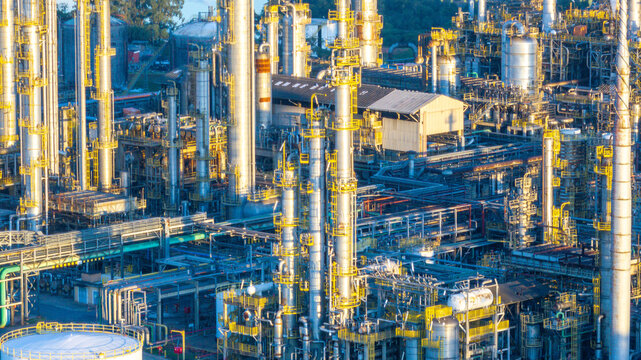 Aerial view of the Capuava Petrochemical Complex featuring tall distillation columns, intricate pipeline networks, and industrial infrastructure in Santo Andre, State of Sao Paulo, Brazil.