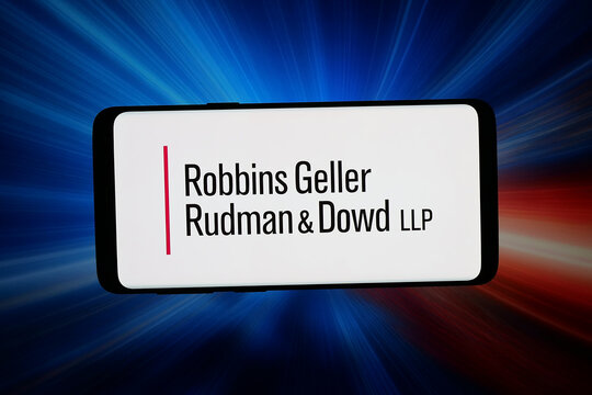 Stuttgart, Germany - 07-20-2026: In this photo illustration, the logo of law firm Robbins Geller Rudman and Dowd LLP is displayed on a smartphone in front of abstract background on computer screen.