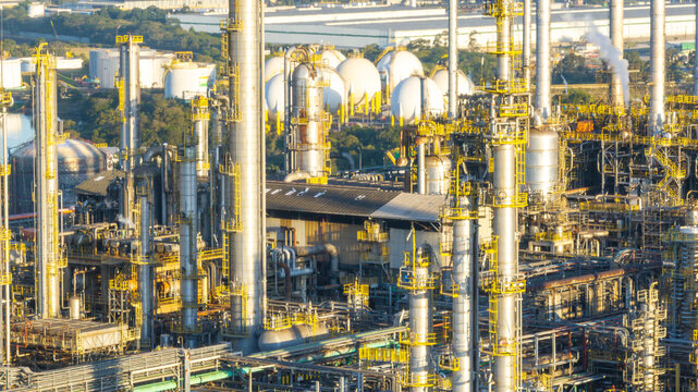 Aerial view of the petrochemical complex in Santo Andre, featuring industrial towers, spherical storage tanks, and piping systems. Santo Andre, State of Sao Paulo, Brazil.