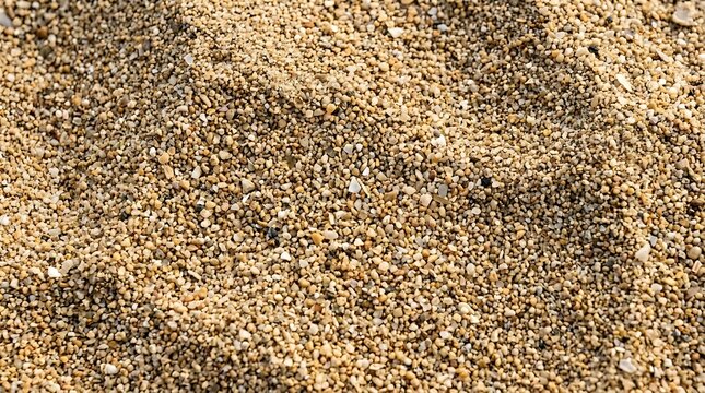 Macro close up texture of fine brown sand grains on a beach surface background