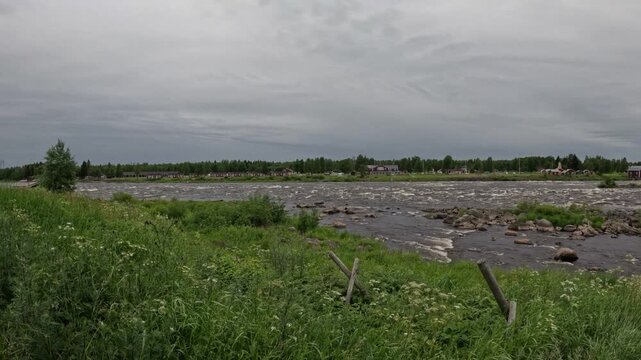 Panoramic view of Kukkolankoski river rapids on Torne River in Finland