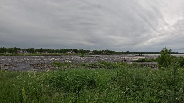 Panoramic wide shot of Kukkolankoski rapids on Torne River