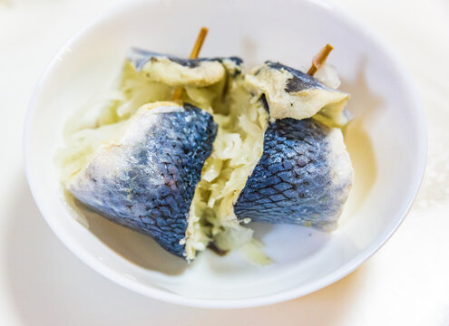 Traditional Central European pickled herring rolls Zavinace rollmops served in a bowl