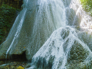 Majestic view of Embon Waterfall and river stream scenery at Pasie Raya, Aceh Jaya, Indonesia © MUAZ JAFFAR