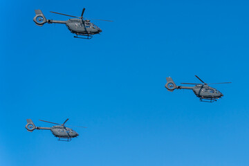 Black modern military transport helicopters flying over Budapest, Hungary © ZenitX