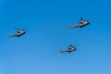 Black modern military transport helicopters flying over Budapest, Hungary © ZenitX